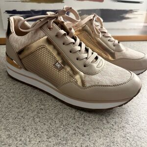 Brand new Michael Kors, size 10 women’s sneakers